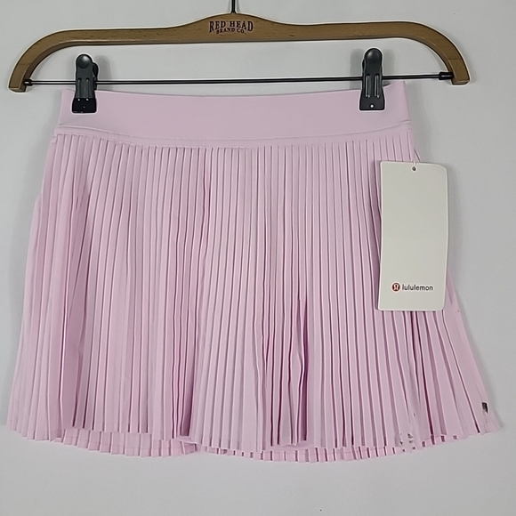 NWT Lululemon Varsity HR Pleated Tennis Skirt Pink Organza Size 4 *dirty spot - Picture 1 of 8